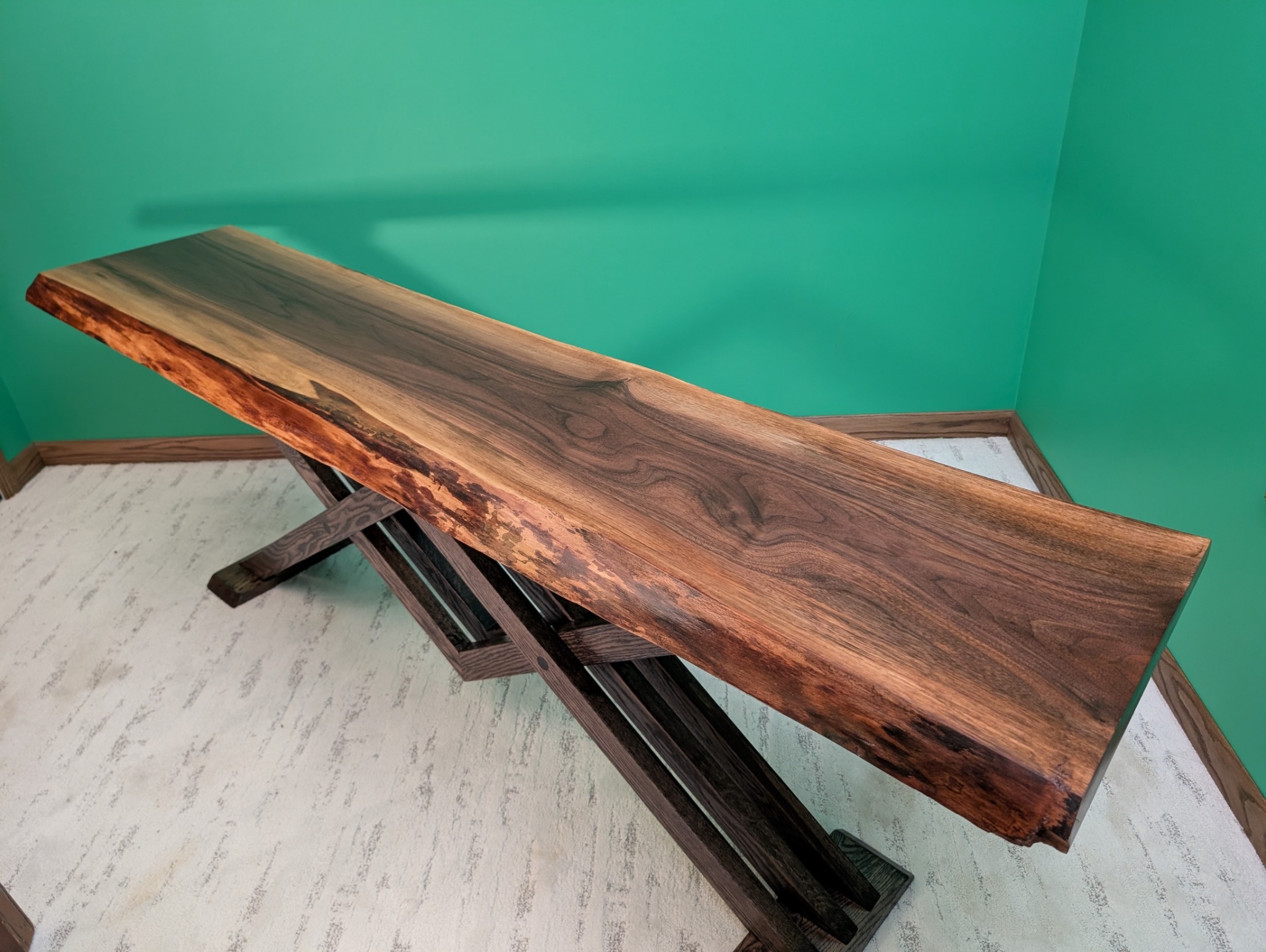 Elevated view showing the full sweep of the walnut grain